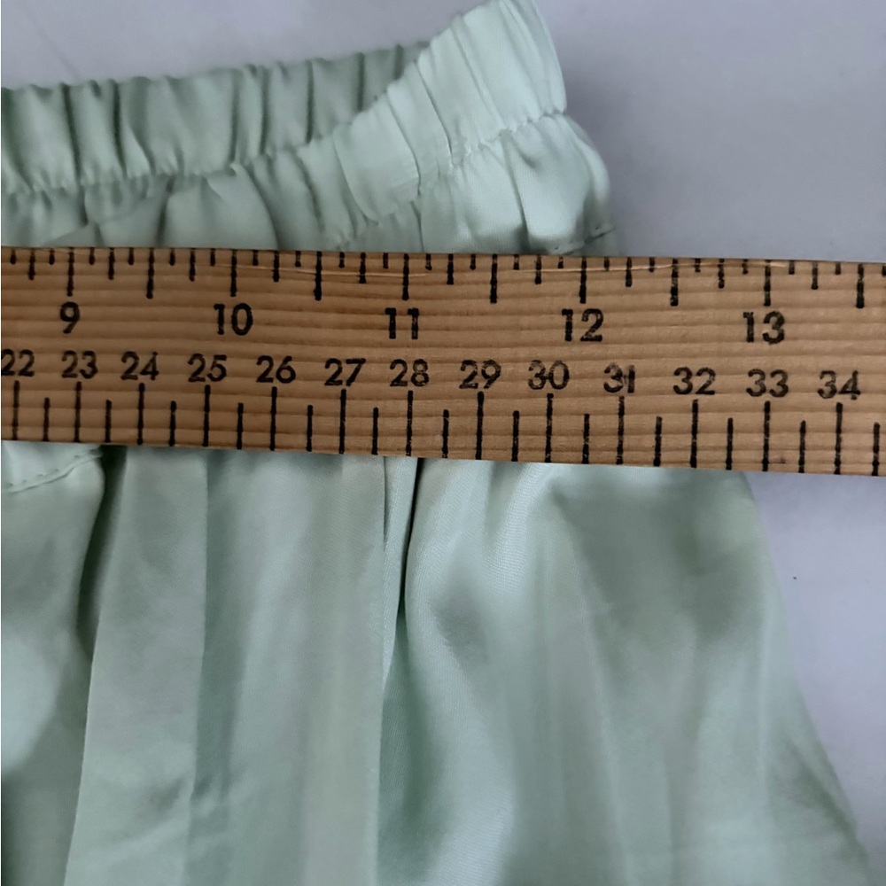 Party Pajama Pants with Detachable Feathers in Mint
SLEEPER size small - Picture 7 of 10